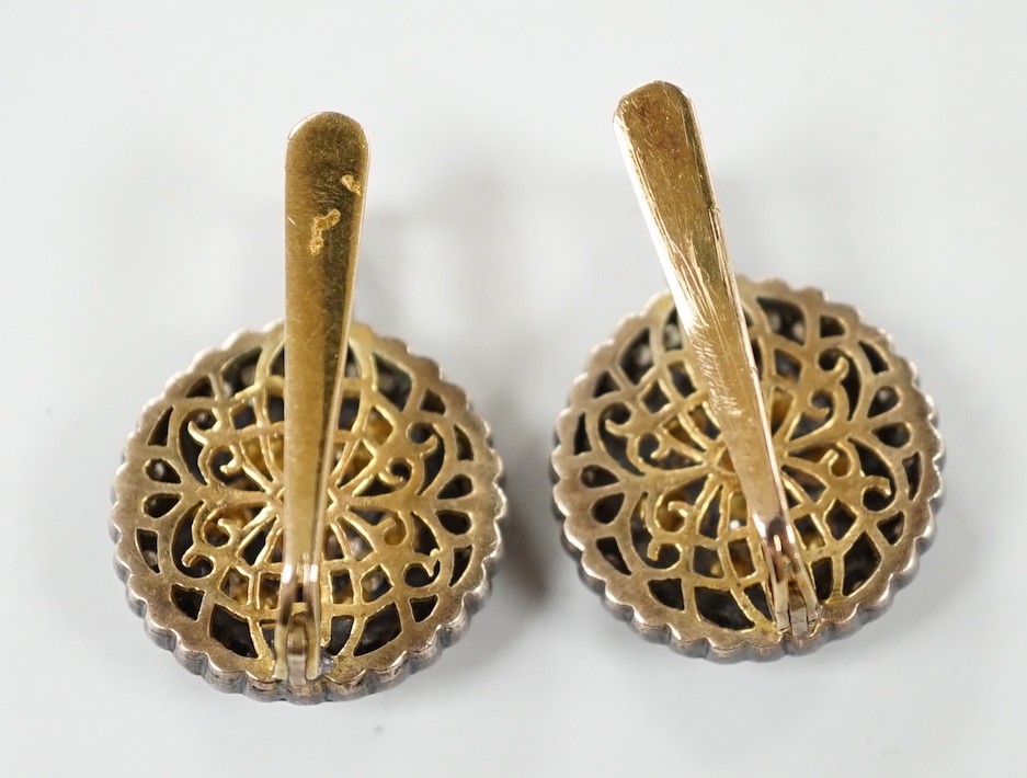 A pair of Indian, yellow and white metal, rose and rout cut diamond set target cluster earrings, diameter 18mm, gross weight 11.8 grams.